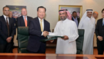 Cheng Niruttinanon, executive chairman of Thai Union and Bader Aujan, CEO of Savola Foods Company exchange a handshake after the joint venture agreement at Savola Foods’ headquarters in Jeddah, Saudi Arabia. Also attended were Joerg Ayrle, group CFO and Faisal Sheikh, director of group strategy of Thai Union.