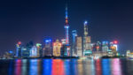 Shanghai skyline at night. Credit: Seksan 99/Shutterstock.com