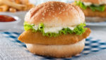 Fish burger made with pollock. Credit: Foodio/Shutterstock.com