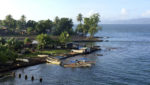 Scene from the port of Alotau, Milne Bay, Papua New Guinea. Credit: Marina Riley/Shutterstock.com