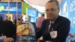 Regal Springs CEO Achim Eichenlaub, showcases the new Naturally Better Tilapia packaging at Seafood Expo Global 2019 in Brussels. Credit: Dan Gibson/Undercurrent News