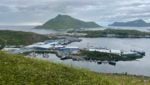 Seafood processors and green mountains in Dutch Harbor, Alaska